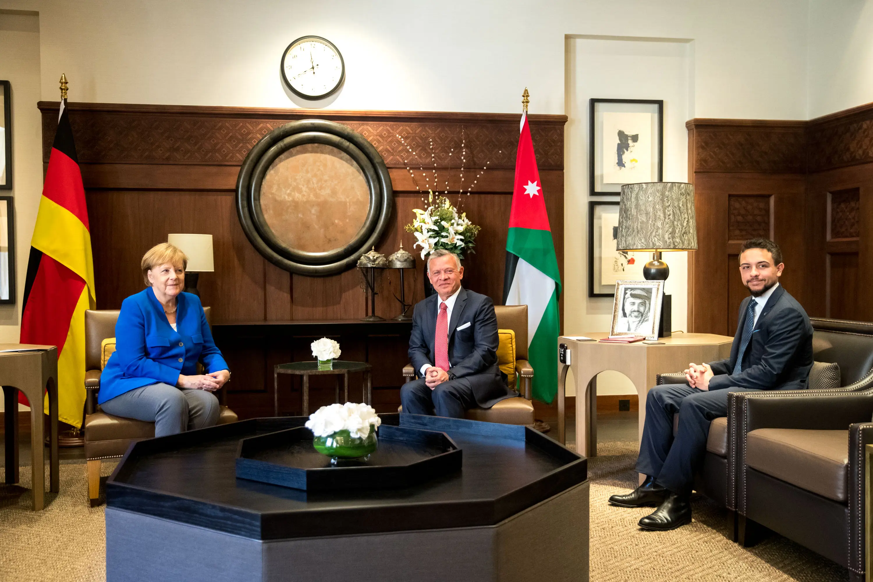 King, German chancellor hold talks at Al Husseiniya Palace