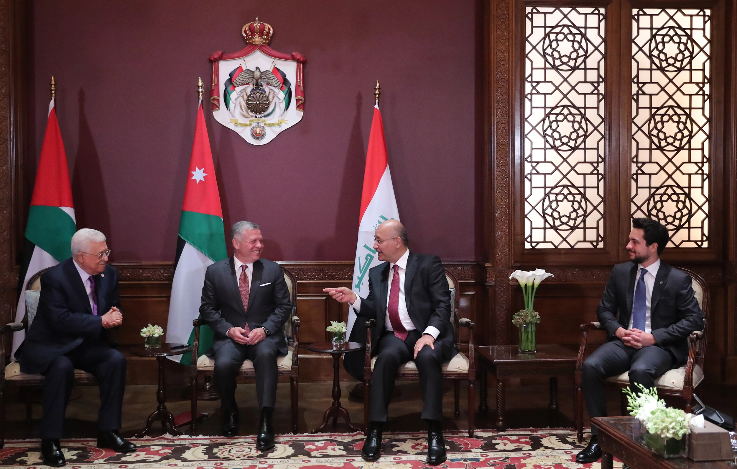 King holds trilateral meeting with Iraqi, Palestinian presidents