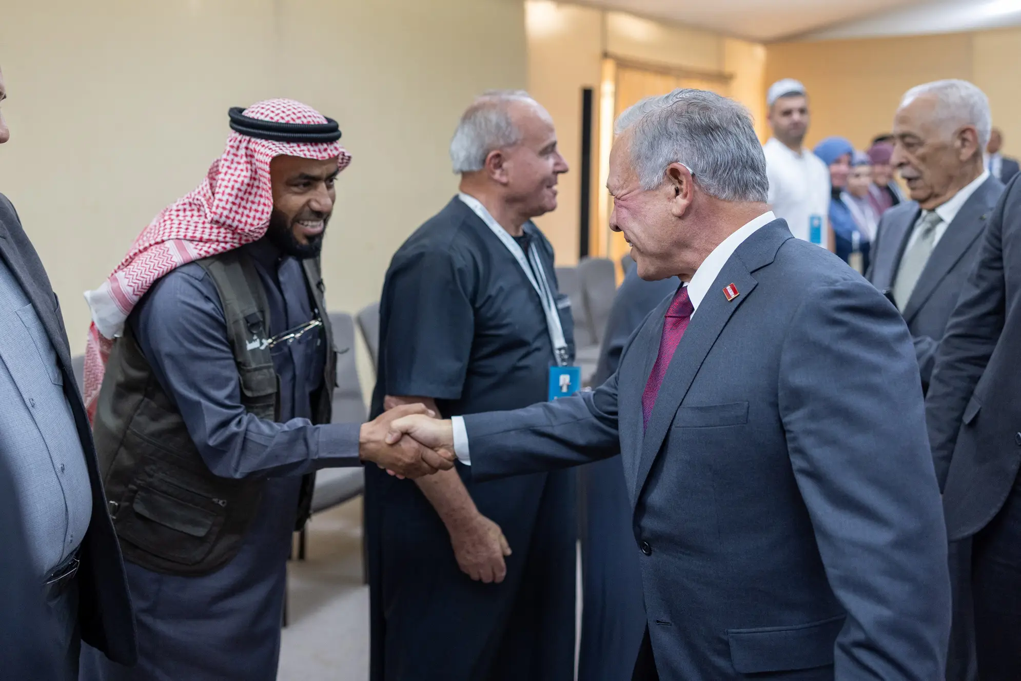 King sees off families of martyrs leaving to perform Hajj